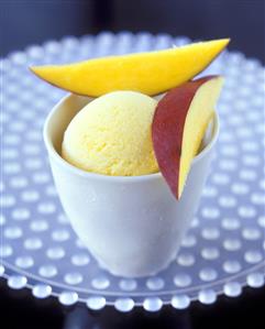 Mango & lemon ice cream in a tub