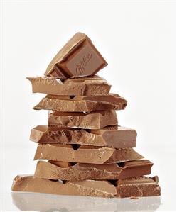 Pieces of Milka chocolate in a pile