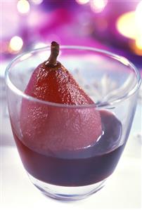 Red wine pear, served in a glass