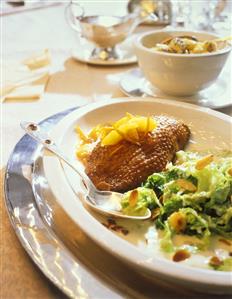 Goose breast with orange sauce and savoy