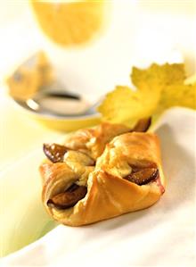 Plum and quark kolatsche (filled yeast pastry)