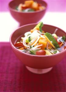 Asian rice noodle soup with vegetables