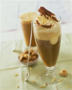 Almond iced coffee with cream topping & grated chocolate