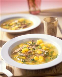 Curried duck soup with mango