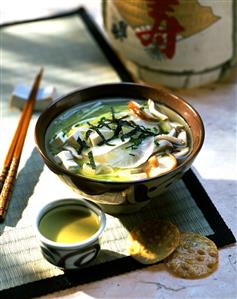 Japanese miso soup with tofu, radish and mushrooms