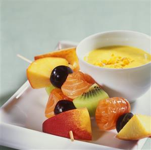 Smoked salmon and fruit kebabs with curried orange mousse