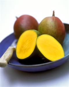 Mangos, one cut open