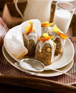 Four pineapple and poppy seed muffins