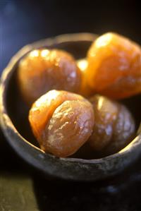 Terracotta bowl of candied sweet chestnuts (1)