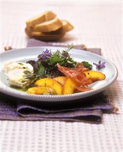 Wild herb salad with peaches, goat's cheese & basil oil