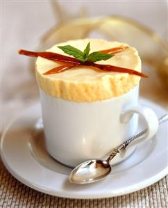 Lemon ice cream soufflé, garnished with caramel sticks