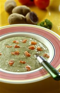 Smooth potato and leek soup made from purple potatoes