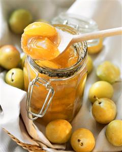 Greengage jam in preserving jar