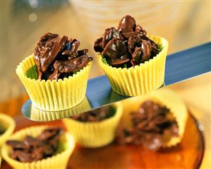 Home-made chocolate crispies in paper cases