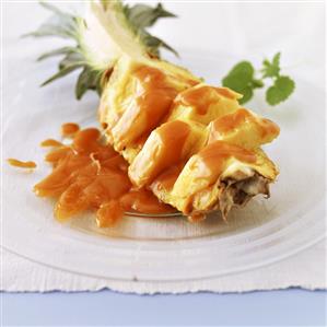 Fresh pineapple in caramel sauce