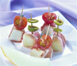 Bocconcini (melon, ham, olives, tomatoes on cocktail sticks)