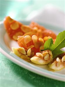 Barbecued fruit with flaked almonds