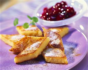 Fried semolina slices with cherries