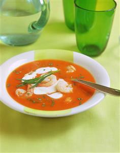 Tomato soup with shrimps and sour cream