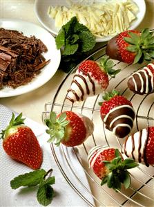 Chocolate-dipped strawberries on cake rack