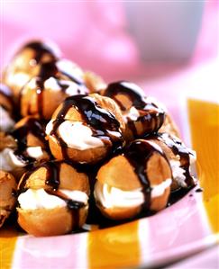 Cream puff with chocolate sauce