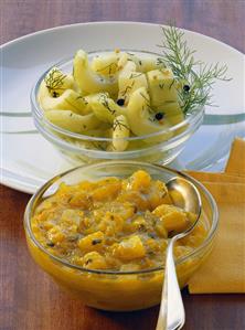 Dill pickles and cucumber and pineapple relish