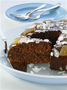 Chocolate pineapple cake with coconut shavings