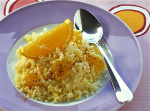 Orange couscous with cinnamon for children