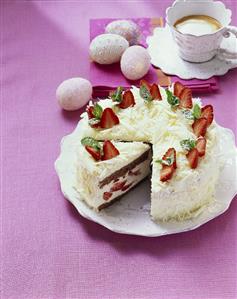 Strawberry tiramisu gateau with white chocolate curls