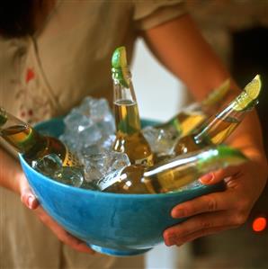 Corona (Mexican beer) with slice of lime on ice