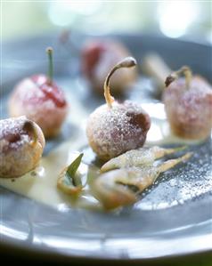 Baked cherries with sage on custard