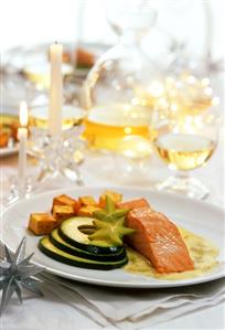 Salmon steak with avocado and diced potatoes