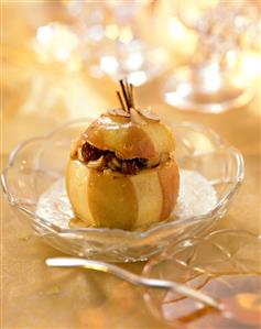 Baked apple with hazelnut and raisin filling