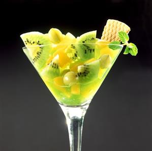 Fruit sundae with kiwi fruit, pineapple and cape gooseberries