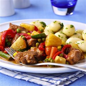 Sweet and sour pork with vegetables and pineapple