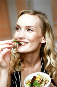 Blond woman with vegetable & date rice (1001 nights rice, 1)