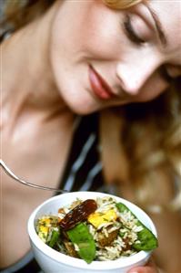 Blond woman with vegetable & date rice (1001 nights rice, 2)