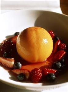 Poached pear with berries