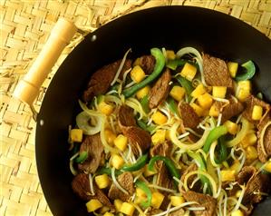 Asian wok dish with beef, peppers and pineapple