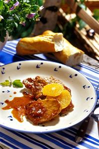 Roast pork with orange sauce