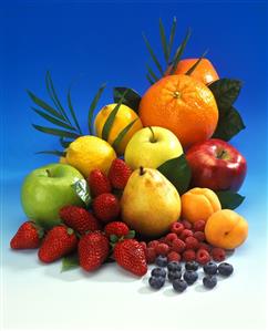 Still life with fresh home-produced and exotic fruit