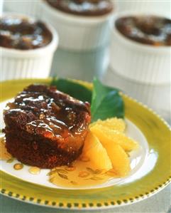 Chocolate cake with orange sauce