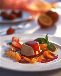 Orange parfait with strawberry sauce