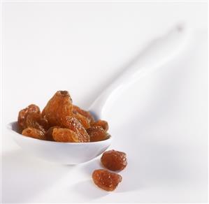 Raisins on spoon