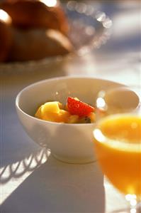 Breakfast: orange juice, fruit and baked goods