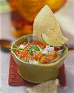 Tomato soup with cheese and chili pepper