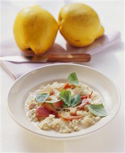 Quince risotto with diced ham and basil