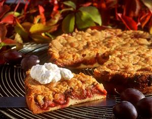 Plum crumble cake, a piece cut