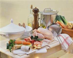 Still life with soup ingredients, soup tureen, pan etc.