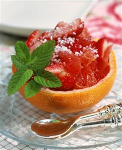 Strawberry & grapefruit salad served in hollowed-out grapefruit